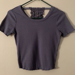 blue shirt with button detail on back